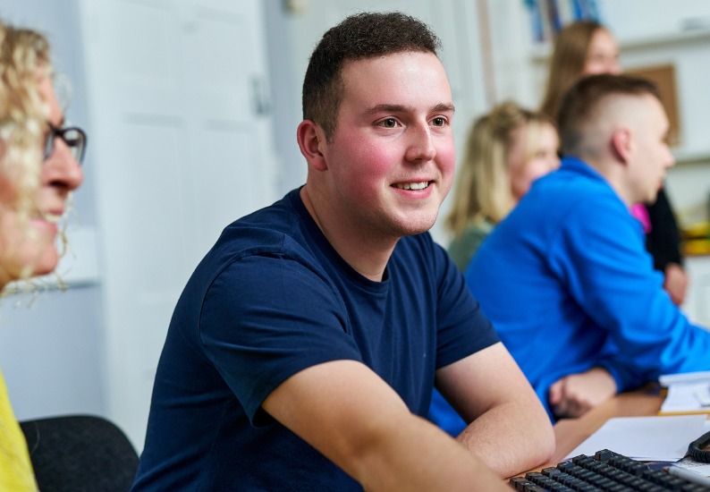 Male accountant working at desk