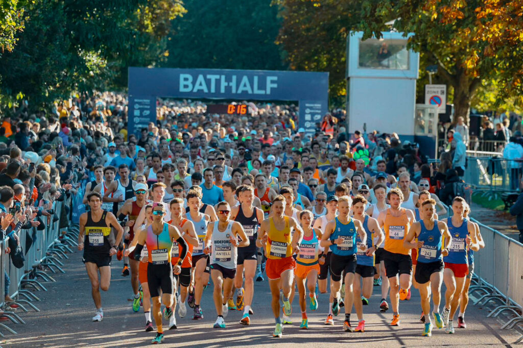 Photo of large group of runners at start line of Bath half marathon