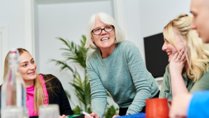 Female accountant in meeting with clients