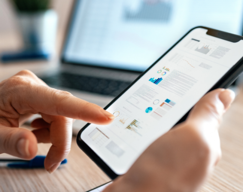 person using finance app on phone