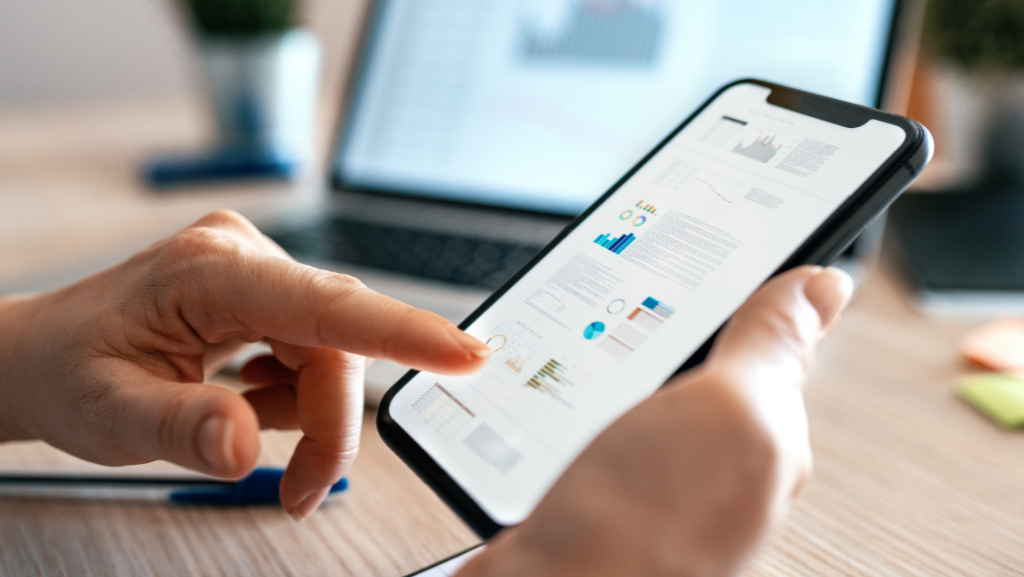person using finance app on phone