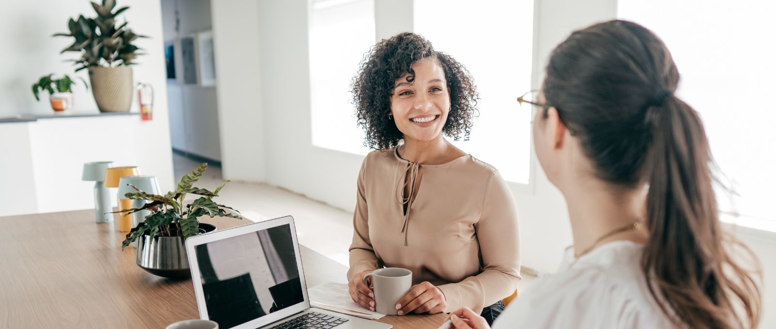 Two women having conversation HR manager